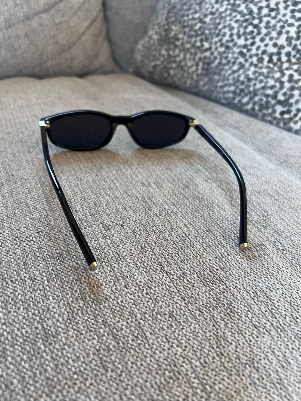 Miu Miu Black Sunglasses with Gold Accent - Classic Cat-Eye Style